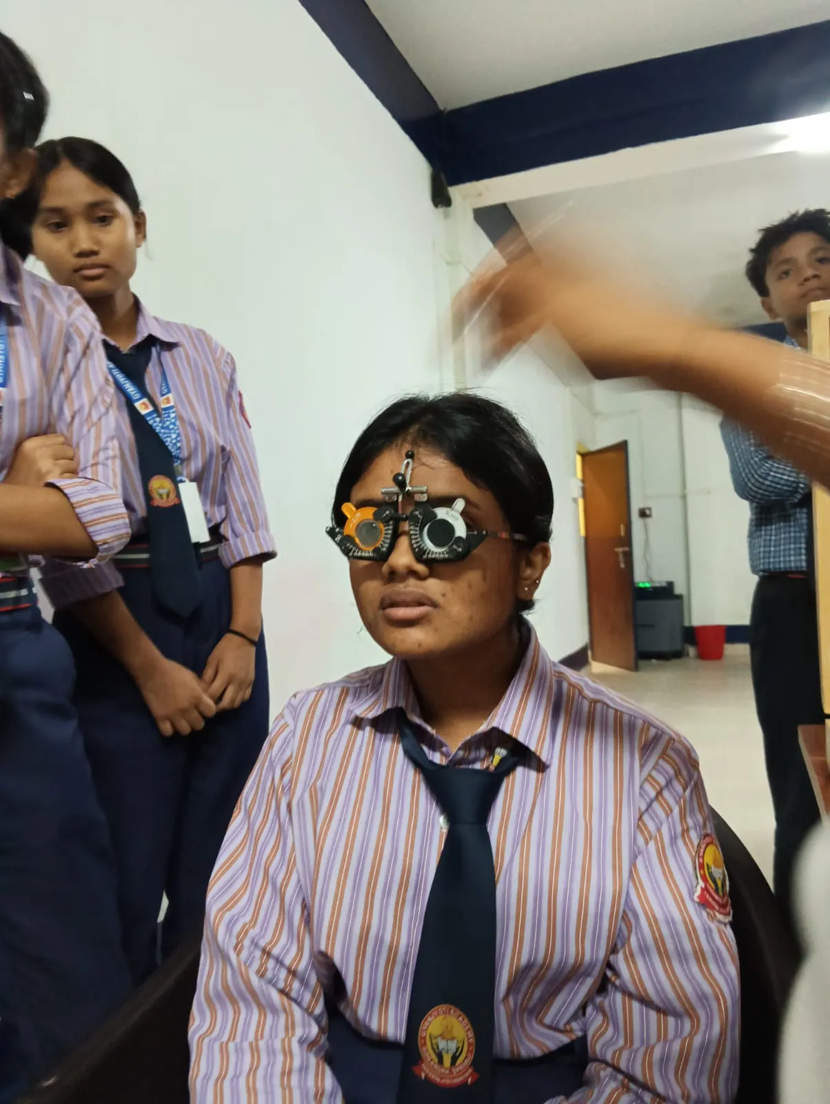 Clinical eye screening and check-up for students.